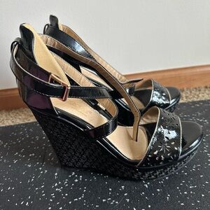 Black wedge sandals. Never worn.